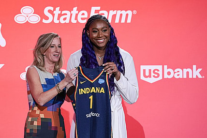 Apr 10, 2023; New York, NY, USA; Aliyah Boston poses for a photo with WNBA Commissioner Cathy Engelbert after being drafted first overall by the Indiana Fever during WNBA Draft 2023 at Spring Studio. Mandatory Credit: Vincent Carchietta-USA TODAY Sports