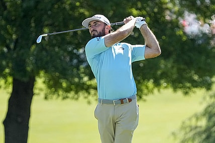 May 4, 2023; Charlotte, North Carolina, USA; Max Homa hits his second shot on the third hole during the first round of the Wells Fargo Championship golf tournament. Mandatory Credit: Jim Dedmon-USA TODAY Sports