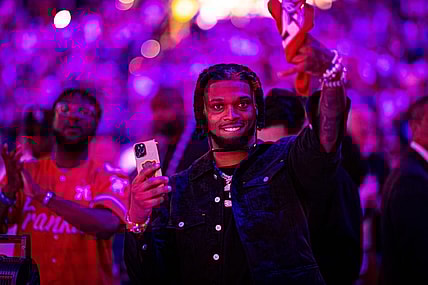 May 11, 2023; Philadelphia, Pennsylvania, USA; NFL player Damar Hamlin cheers during player introductions before game six of the 2023 NBA playoffs between the Philadelphia 76ers and the Boston Celtics at Wells Fargo Center. Mandatory Credit: Bill Streicher-USA TODAY Sports