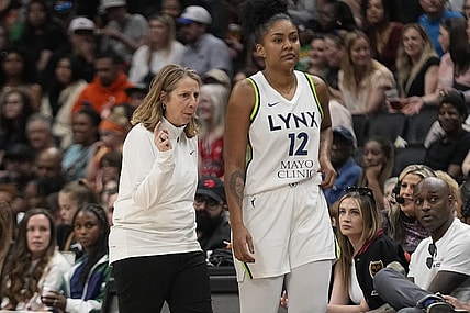 May 13, 2023; Toronto, Ontario, Canada; Minnesota Lynx head coach Cheryl Reeve talks to forward Damiris Dantas (12) during a timeout against the Chicago Sky during the first half at Scotiabank Arena. Mandatory Credit: John E. Sokolowski-USA TODAY Sports