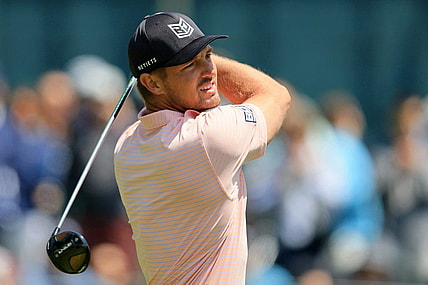 May 18, 2023; Rochester, New York, USA; Bryson DeChambeau tees off on the 14th hole during the first round of the PGA Championship golf tournament at Oak Hill Country Club. Mandatory Credit: Aaron Doster-USA TODAY Sports