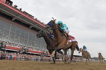 May 20, 2023; Baltimore, Maryland, USA;  National Treasure with John R. Velazquez up (1) defeats Blazing Sevens with Irad Ortiz, Jr. up (7) to win the 148th running of the Preakness Stakes at Pimlico Race Course. Mandatory Credit: Tommy Gilligan-USA TODAY Sports