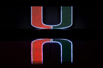 Dec 8, 2020; Coral Gables, Florida, USA; A general view of a reflection of the Miami Hurricanes school logo on the scorers table prior to the game between the Miami Hurricanes and the Purdue Boilermakers at Watsco Center. Mandatory Credit: Jasen Vinlove-USA TODAY Sports