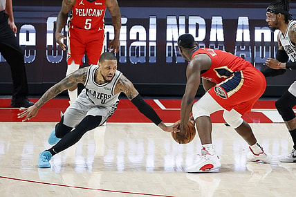 Trade chatter before Thursday's NBA draft connects Portland Trail Blazers point guard Damian Lillard (left) with New Orleans Pelicans power forward Zion Williamson. Mandatory Credit: Soobum Im-USA TODAY Sports