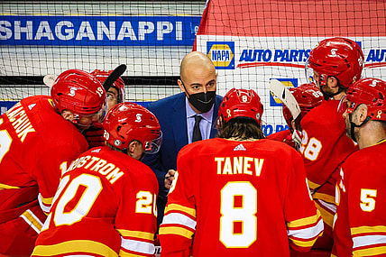 Mar 27, 2021; Calgary, Alberta, CAN; Calgary Flames assistant Coach Ryan Huska on his bench against the Winnipeg Jets during the third period at Scotiabank Saddledome. Mandatory Credit: Sergei Belski-USA TODAY Sports