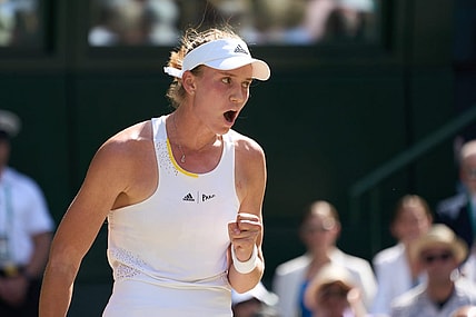 Jul 9, 2022; London, England, United Kingdom;  Elena Rybakina (KAZ)  celebrates on her way to winning her women   s singles final against Ons Jabeur (TUN) on Centre court at All England Lawn Tennis and Croquet Club. Mandatory Credit: Peter van den Berg-USA TODAY Sports