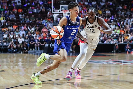 Sep 18, 2022; Uncasville, Connecticut, USA; Connecticut Sun guard Natisha Hiedeman (2) and Las Vegas Aces guard Chelsea Gray (12) during game four of the 2022 WNBA Finals at Mohegan Sun Arena. Mandatory Credit: Wendell Cruz-USA TODAY Sports