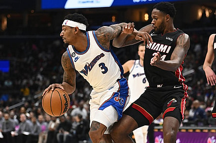Nov 18, 2022; Washington, District of Columbia, USA; Washington Wizards guard Bradley Beal (3) dribbles as Miami Heat forward Haywood Highsmith (24) defends during the second half at Capital One Arena. Mandatory Credit: Brad Mills-USA TODAY Sports