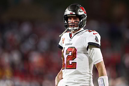 Jan 16, 2023; Tampa, Florida, USA; Tampa Bay Buccaneers quarterback Tom Brady (12) looks on before a  wild card game against the Dallas Cowboys at Raymond James Stadium. Mandatory Credit: Nathan Ray Seebeck-USA TODAY Sports