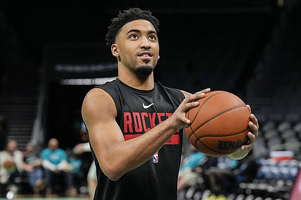 Apr 7, 2023; Charlotte, North Carolina, USA; Houston Rockets forward Kenyon Martin Jr. (6) shoots during pregame warm ups against the Charlotte Hornets at the Spectrum Center. Mandatory Credit: Jim Dedmon-USA TODAY Sports