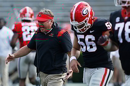 Georgia head coach Kirby Smart speaks with the black team during the UGA G-Day spring football game at Sanford Stadium in Athens on Saturday.

News Joshua L Jones