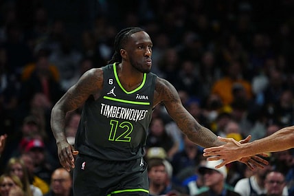 Apr 25, 2023; Denver, Colorado, USA; Minnesota Timberwolves forward Taurean Prince (12) celebrates his three point score in the first half against the Denver Nuggets in game five of the 2023 NBA Playoffs at Ball Arena. Mandatory Credit: Ron Chenoy-USA TODAY Sports