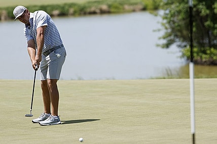 May 27, 2023; Potomac Falls, Virginia, USA; Bryson DeChambeau putts on the eighteenth green during the second round of LIV Golf Washington, D.C. golf tournament at Trump National. Mandatory Credit: Geoff Burke-USA TODAY Sports