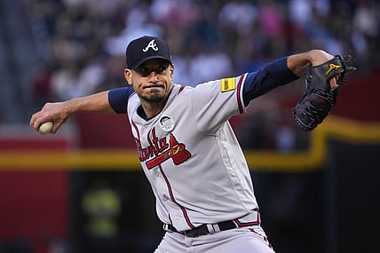 Jun 2, 2023; Phoenix, Arizona, USA; Atlanta Braves starting pitcher Charlie Morton (50) pitches against the Arizona Diamondbacks during the third inning at Chase Field. Mandatory Credit: Joe Camporeale-USA TODAY Sports