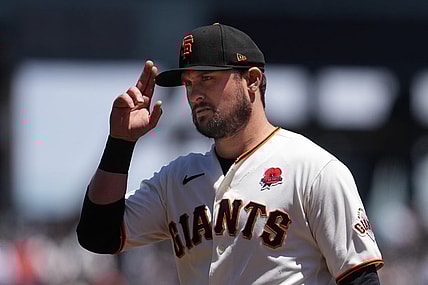 May 29, 2023; San Francisco, California, USA; San Francisco Giants third baseman J.D. Davis (7) gestures before the game against the Pittsburgh Pirates at Oracle Park. Mandatory Credit: Darren Yamashita-USA TODAY Sports