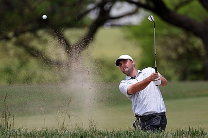Jun 12, 2023; Los Angeles, California, USA; Scottie Scheffler hits out of a bunker on the 16th green during a practice round of the U.S. Open golf tournament. Mandatory Credit: Kiyoshi Mio-USA TODAY Sports