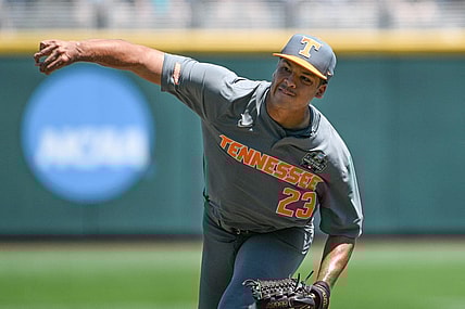 Jun 19, 2023; Omaha, NE, USA;  Tennessee Volunteers pitcher Chase Burns (23) throws against the Stanford Cardinal in the fourth inning at Charles Schwab Field Omaha. Mandatory Credit: Steven Branscombe-USA TODAY Sports
