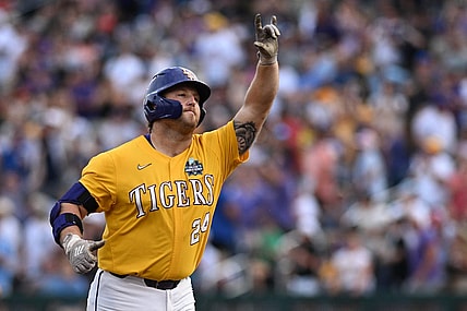 Jun 21, 2023; Omaha, NE, USA;  LSU Tigers designated hitter Cade Beloso (24) reacts after hitting a three run home run against the Wake Forest Demon Deacons in the third inning at Charles Schwab Field Omaha. Mandatory Credit: Steven Branscombe-USA TODAY Sports