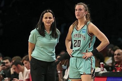 Jun 1, 2022; Brooklyn, New York, USA; New York Liberty head coach Sandy Brondello and guard Sabrina Ionescu (20) talk prior to a substitution in the first quarter against the Indiana Fever at Barclays Center. Mandatory Credit: Wendell Cruz-USA TODAY Sports