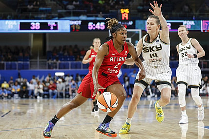 Jun 17, 2022; Chicago, Illinois, USA; Atlanta Dream guard Aari McDonald (2) drives to the basket against Chicago Sky guard Allie Quigley (14) during the first half of a WNBA game at Wintrust Arena. Mandatory Credit: Kamil Krzaczynski-USA TODAY Sports