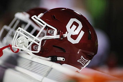 Nov 26, 2022; Lubbock, Texas, USA;  A general view oaf an Oklahoma Sooners helmet on the bench during the game between against the Texas Tech Red Raiders at Jones AT&T Stadium and Cody Campbell Field. Mandatory Credit: Michael C. Johnson-USA TODAY Sports