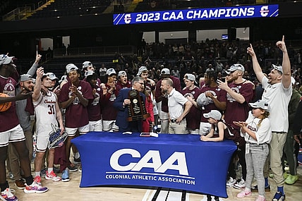 Mar 7, 2023; Washington, D.C., USA;  Colonial Athletic Association commissioner Joe D'Antonio presents Charleston Cougars head coach Pat Kelsey the conference championship trophy after defeating North Carolina-Wilmington Seahawks  at Entertainment & Sports Arena. Mandatory Credit: Tommy Gilligan-USA TODAY Sports