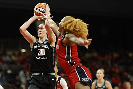 May 19, 2023; Washington, District of Columbia, USA; New York Liberty forward Breanna Stewart (30) shoots the ball as Washington Mystics center Shakira Austin (0) defends at Entertainment & Sports Arena. Mandatory Credit: Geoff Burke-USA TODAY Sports