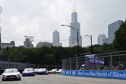 Jul 1, 2023; Chicago, Illinois, USA; Xfinity Series driver Cole Custer (00) leads the field along Grant Park during The Loop 121 of the Chicago Street Race. Mandatory Credit: Mike Dinovo-USA TODAY Sports
