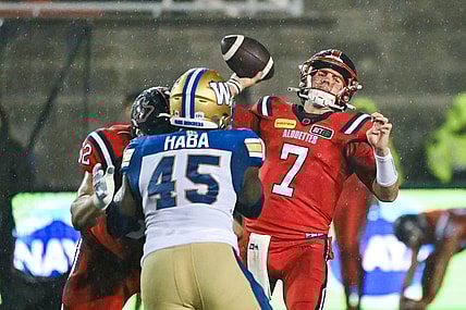 Jul 1, 2023; Montreal, Quebec, CAN; Montreal Alouettes quarterback Cody Fajardo (7) passes the ball against the Winnipeg Blue Bombers during the third quarter at Percival Molson Memorial Stadium. Mandatory Credit: David Kirouac-USA TODAY Sports