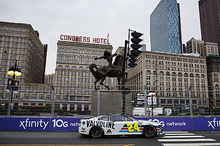 Jul 2, 2023; Chicago, Illinois, USA; NASCAR Cup Series driver William Byron (24) races along Grant Park during the Grant Park 220 of the Chicago Street Race at Chicago Street Race. Mandatory Credit: Mike Dinovo-USA TODAY Sports