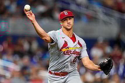 Jul 6, 2023; Miami, Florida, USA; St. Louis Cardinals starting pitcher Jack Flaherty (22) throws the ball to first base against the Miami Marlins during the seventh inning at loanDepot Park. Mandatory Credit: Rich Storry-USA TODAY Sports