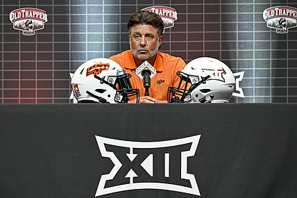Jul 12, 2023; Arlington, TX, USA; Oklahoma State head coach Mike Gundy is interviewed during Big 12 football media day at AT&T Stadium. Mandatory Credit: Jerome Miron-USA TODAY Sports