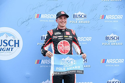Jul 15, 2023; Loudon, New Hampshire, USA;NASCAR Cup Series driver Christopher Bell (20) celebrates winning the #1 pole position for the Crayon 301 at New Hampshire Motor Speedway. Mandatory Credit: Eric Canha-USA TODAY Sports
