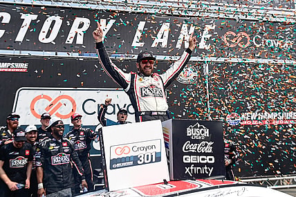 Jul 17, 2023; Loudon, New Hampshire, USA; NASCAR Cup Series driver Martin Truex Jr. (19) celebrates winning the Crayon 301 at New Hampshire Motor Speedway. Mandatory Credit: Eric Canha-USA TODAY Sports