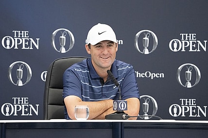 July 18, 2023; Hoylake, ENGLAND, GBR; Scottie Scheffler addresses the media in a press conference during a practice round of The Open Championship golf tournament at Royal Liverpool. Mandatory Credit: Kyle Terada-USA TODAY Sports