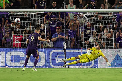 Jul 21, 2023; Orlando, FL, USA;  Orlando City forward Ercan Kara (9) scores a goal during the penalty kick shoot out after the game against Houston Dynamo at Exploria Stadium. Mandatory Credit: Cory Knowlton-USA TODAY Sports