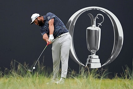 Jul 22, 2023; Hoylake, ENGLAND, GBR; Jon Rahm tees off on the first hole during the third round of The Open Championship golf tournament at Royal Liverpool. Mandatory Credit: Kyle Terada-USA TODAY Sports