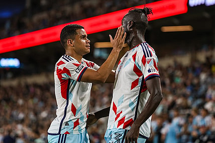 Jul 27, 2023; Saint Paul, MN, USA; Chicago Fire forward Kei Kamara (23) celebrates his goal with defender Miguel Angel Navarro (6) during the second half against the Minnesota United at Allianz Field. Mandatory Credit: Matt Krohn-USA TODAY Sports