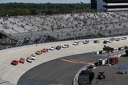 May 15, 2021; Dover, DE, USA; NASCAR XFINITY Series cars sit on the racetrack under a red flag during the Drydene 200 at Dover International Speedway. Mandatory Credit: Matthew OHaren-USA TODAY Sports