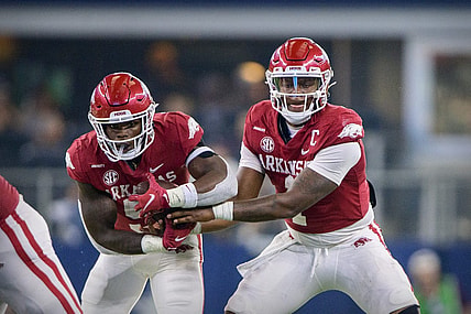 Sep 25, 2021; Arlington, Texas, USA; Arkansas Razorbacks quarterback KJ Jefferson (1) hands off to running back Raheim Sanders (5) during the second half at AT&T Stadium. Mandatory Credit: Jerome Miron-USA TODAY Sports