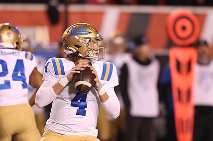 Oct 30, 2021; Salt Lake City, Utah, USA; UCLA Bruins quarterback Ethan Garbers (4) drops back to pass the ball during the first quarter against the Utah Utes at Rice-Eccles Stadium. Mandatory Credit: Rob Gray-USA TODAY Sports