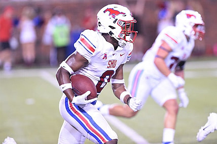 SMU's Bryan Massey (0) returns an interception on the final play of Saturday's game against ACU at Gerald J. Ford Stadium in Dallas on Sept. 4, 2021. The Mustangs won 56-9.

Hof 8420 2