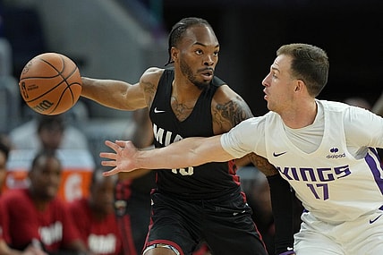 Jul 3, 2022; San Francisco, CA, USA; Miami Heat guard Javonte Smart (15) handles the ball against Sacramento Kings guard Frankie Ferrari (17) during the first quarter at the California Summer League at Chase Center. Mandatory Credit: Darren Yamashita-USA TODAY Sports