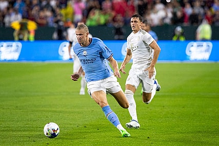 Manchester City forward Erling Haaland (9) runs the ball during the exhibition match against FC Bayern Munich on Saturday, July 23, 2022, at Lambeau Field in Green Bay, Wis.

Gpg Bayern Man City Match 7232022 0014