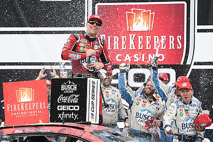 Aug 7, 2022; Brooklyn, Michigan, USA; NASCAR Cup Series driver Kevin Harvick (4) celebrates after winning at Michigan International Speedway. Mandatory Credit: Tim Fuller-USA TODAY Sports