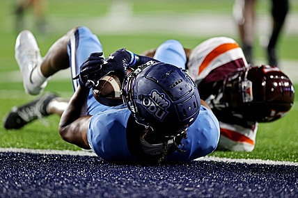 Sep 2, 2022; Norfolk, Virginia, USA;  Old Dominion Monarchs wide receiver Ali Jennings III (0) catches a pass during the fourth quarter against the Virginia Tech Hokies at Kornblau Field at S.B. Ballard Stadium. Mandatory Credit: Peter Casey-USA TODAY Sports