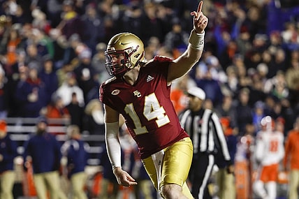 Nov 26, 2022; Chestnut Hill, Massachusetts, USA; Boston College Eagles quarterback Emmett Morehead (14) celebrates a touchdown against the Syracuse Orange during the first quarter at Alumni Stadium. Mandatory Credit: Winslow Townson-USA TODAY Sports