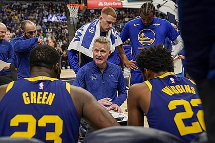 Nov 27, 2022; Minneapolis, Minnesota, USA; Golden State Warriors head coach Steve Kerr talks to his players during a timeout against the Minnesota Timberwolves in the second quarter at Target Center. Mandatory Credit: Nick Wosika-USA TODAY Sports