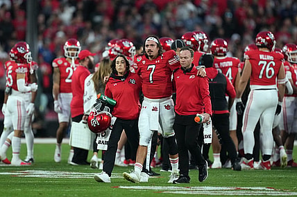 Jan 2, 2023; Pasadena, California, USA; Utah Utes quarterback Cameron Rising (7) walks with assistance off the field in the second half against the Penn State Nittany Lions of the 109th Rose Bowl game at the Rose Bowl. Mandatory Credit: Kirby Lee-USA TODAY Sports