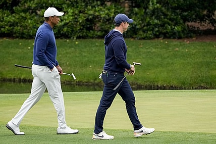 Apr 3, 2023; Augusta, Georgia, USA; Tiger Woods and Rory McIlroy walk onto the 11th green during a practice round for The Masters golf tournament at Augusta National Golf Club. Mandatory Credit: Michael Madrid-USA TODAY Network
